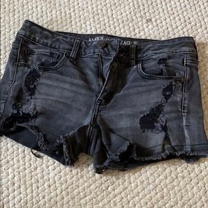 distressed black jean shorts